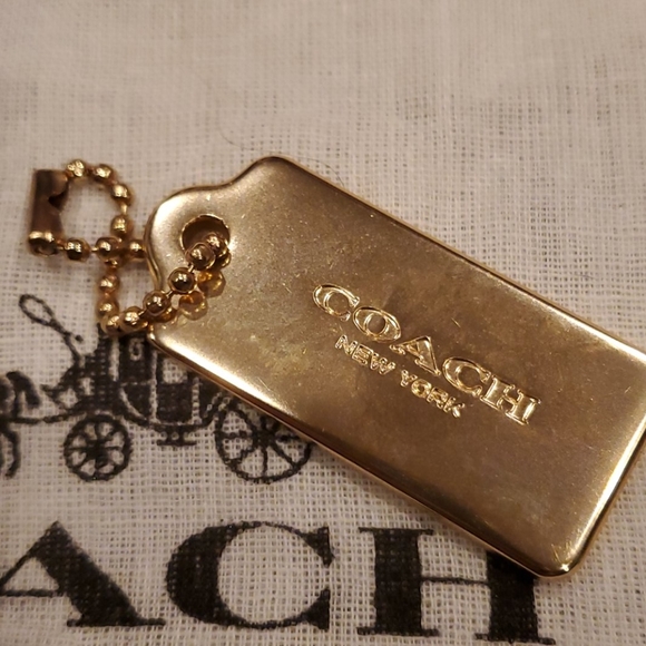 Coach gold metal hang tag Clearance
